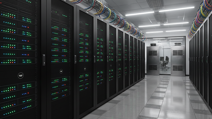 Eye-level view of a modern office server room with blinking lights